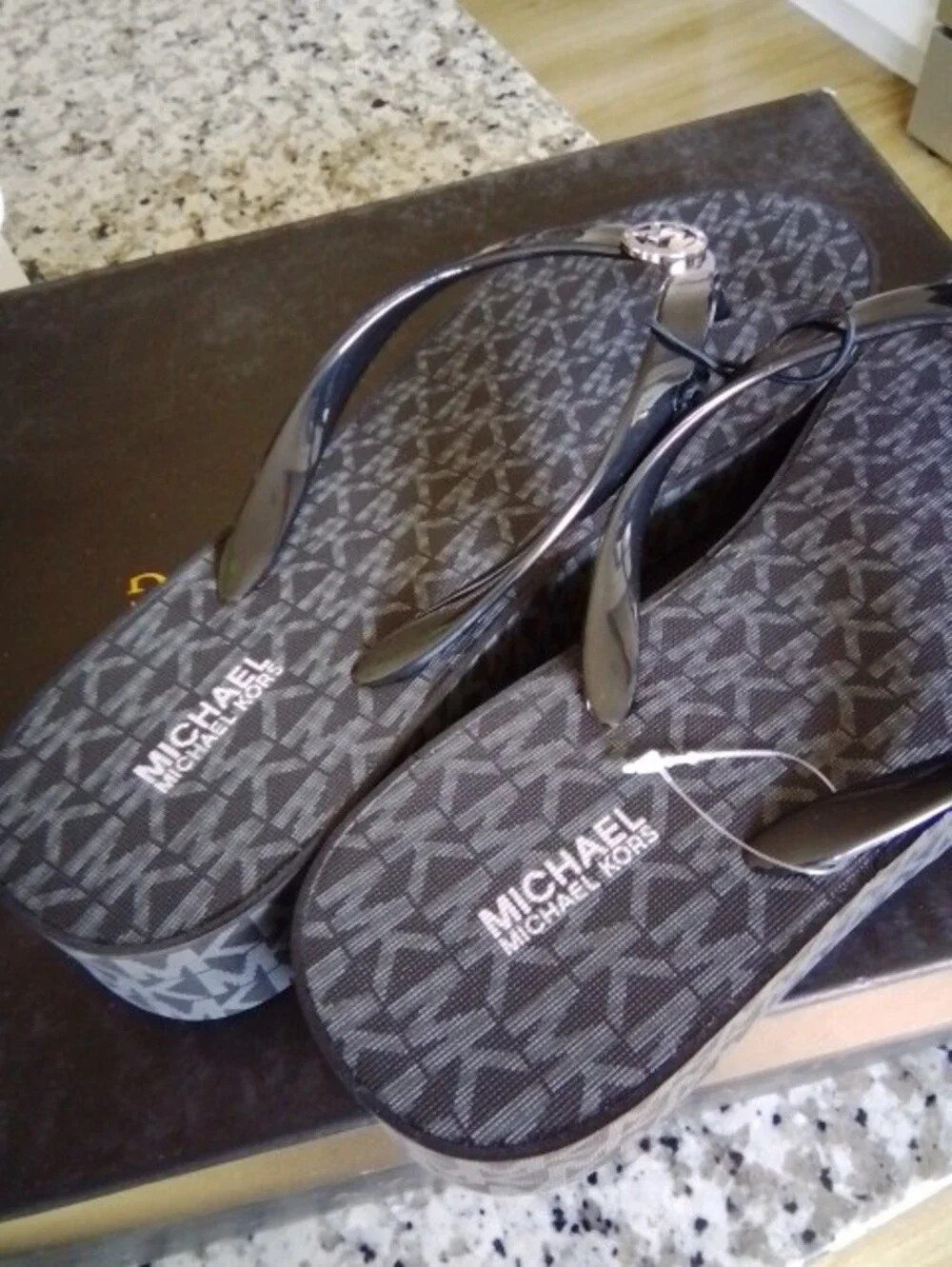 Michael Kors Black Flip Flops with Gold MK Medallions